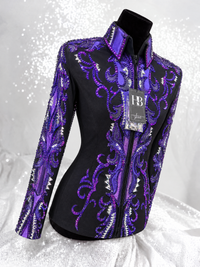 Black showmanship jacket with purple embellishment across the front and sleeve on a mannequin; Item 1005