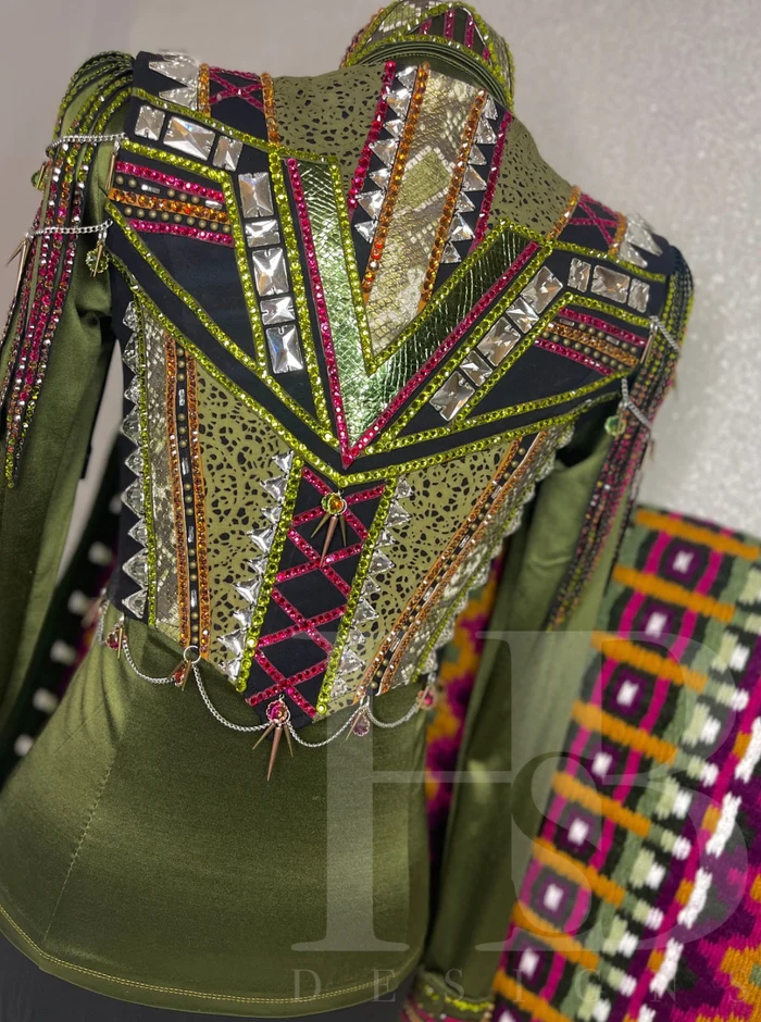 Studio-made statement vest with olive fabric and colorful embellishment